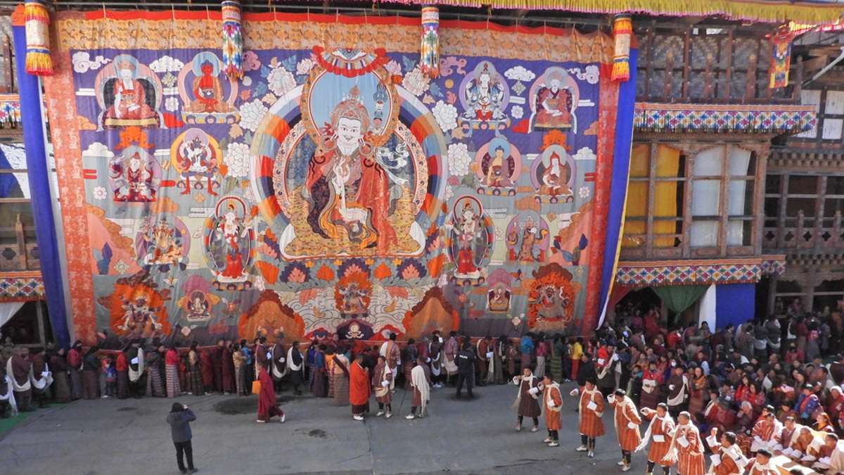 Sacred blessings during the Thongdrel unfurling at Trongsa Tshechu