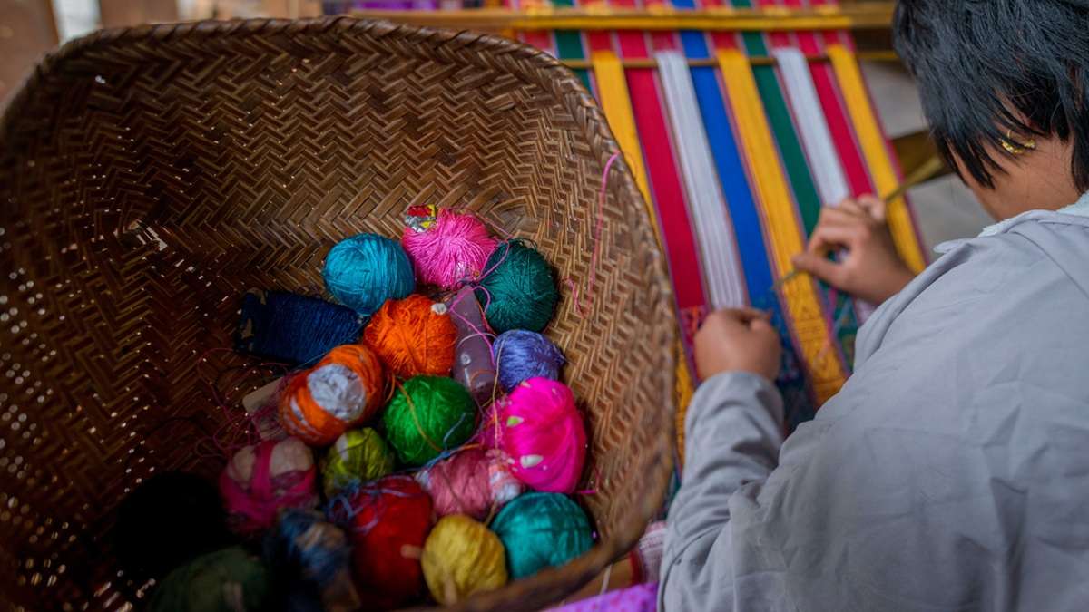 Exquisite silk kira weaving in Khoma Village