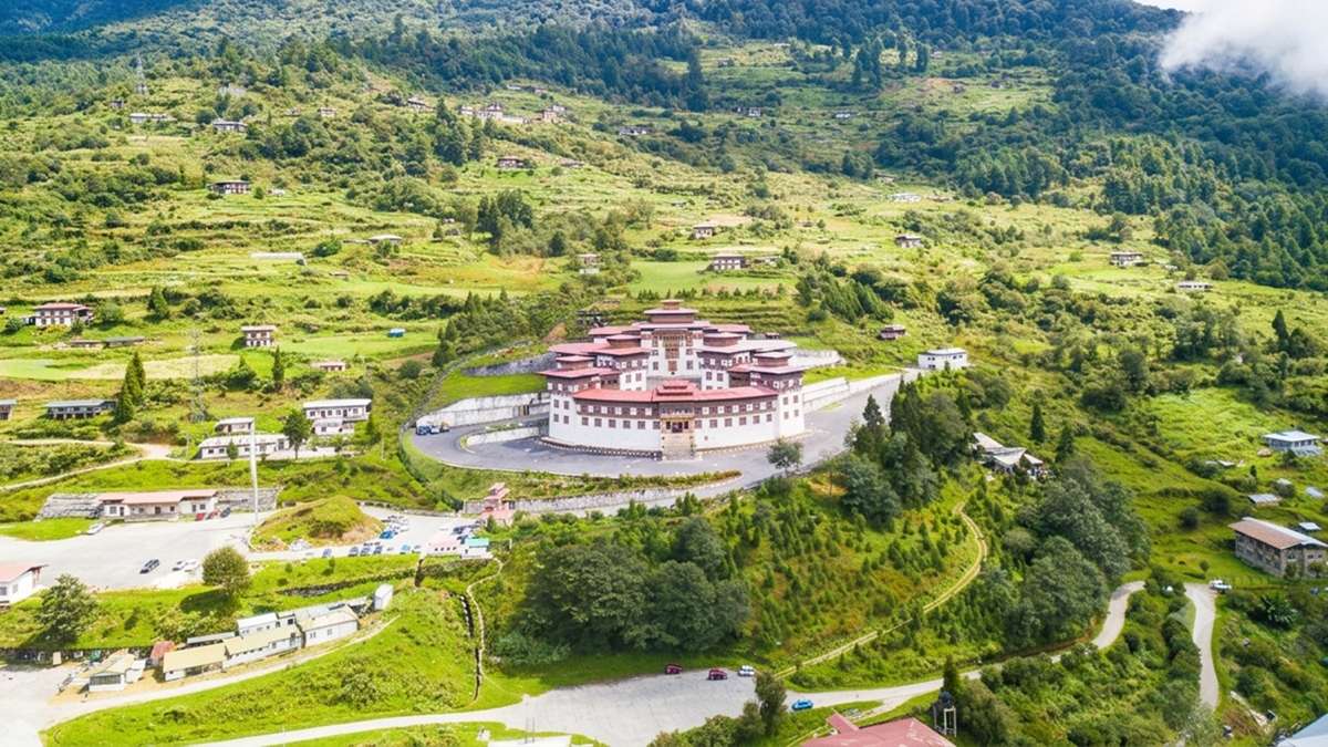 Panoramic mountain serenity surrounding the sacred Ngoedrup Tse