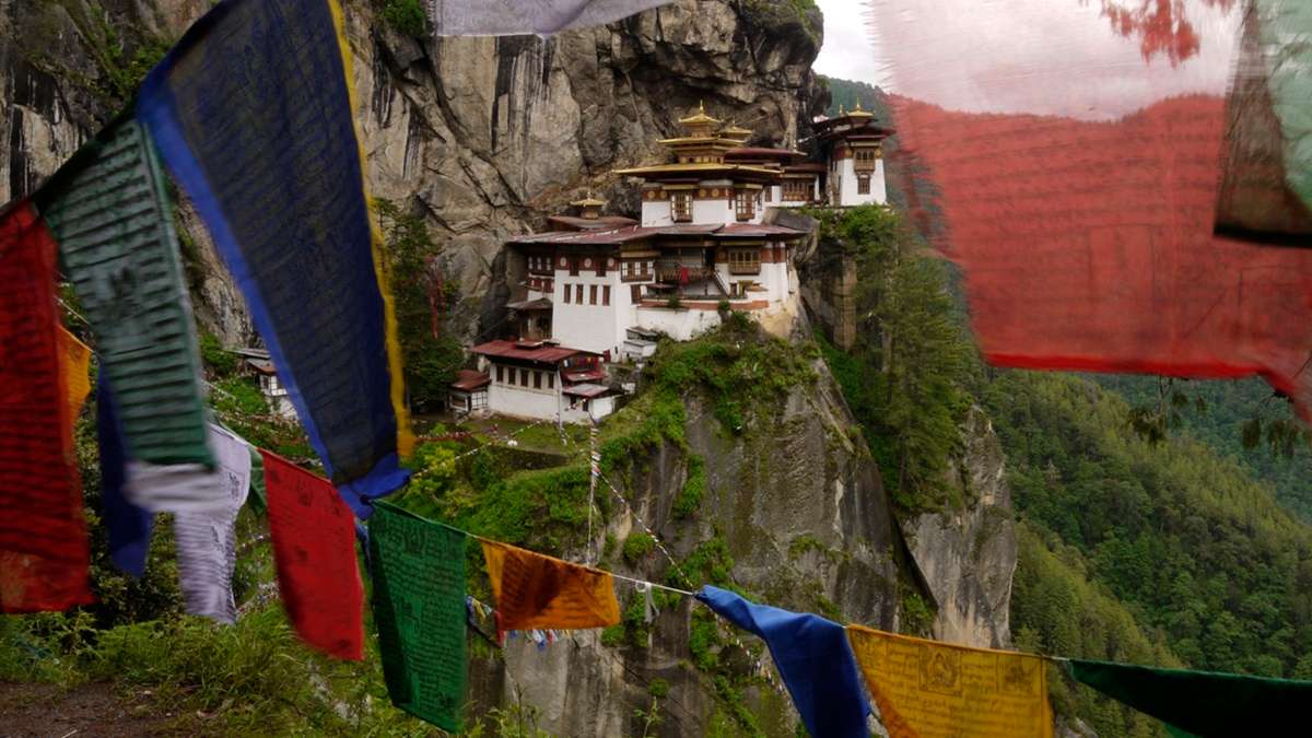 Sacred prayer flags guiding the way to Tigers Nest Monastery