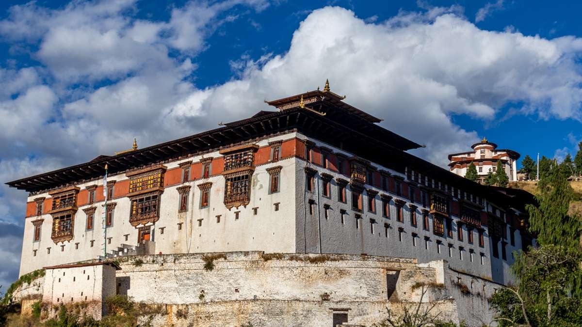 Marvel at the majestic Paro Dzong overlooking the valley